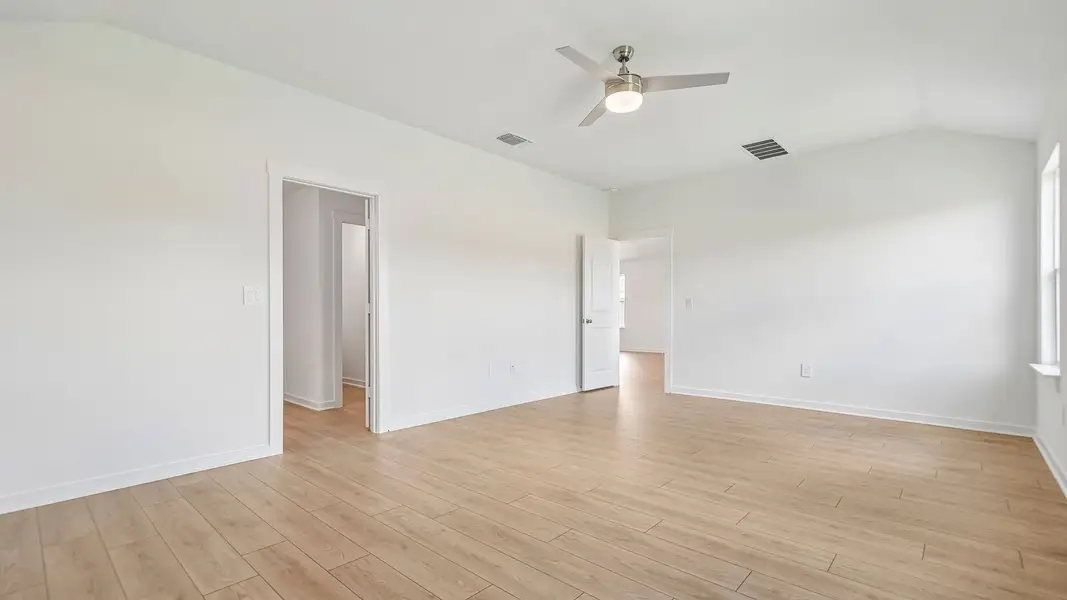 Spacious, unfurnished interior of a new home in Trails at Wildhorse, Austin (Image 36).