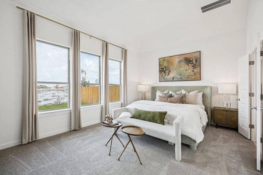 Primary Suite in the Trinity home plan by Trophy Signature Homes – REPRESENTATIVE PHOTO Primary Suite in the Trinity home plan by Trophy Signature Homes – REPRESENTATIVE PHOTO