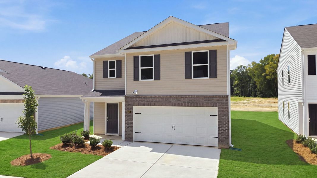 Front exterior of a new home in Carter Ridge, Greenville, NC, highlighting curb appeal (Image 16).