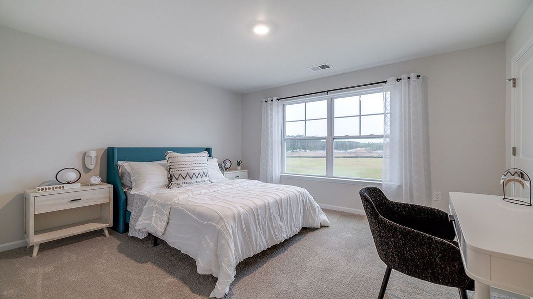 Furnished interior view inside a new home in The Lakes at North Glynn, Brunswick (Image 36).