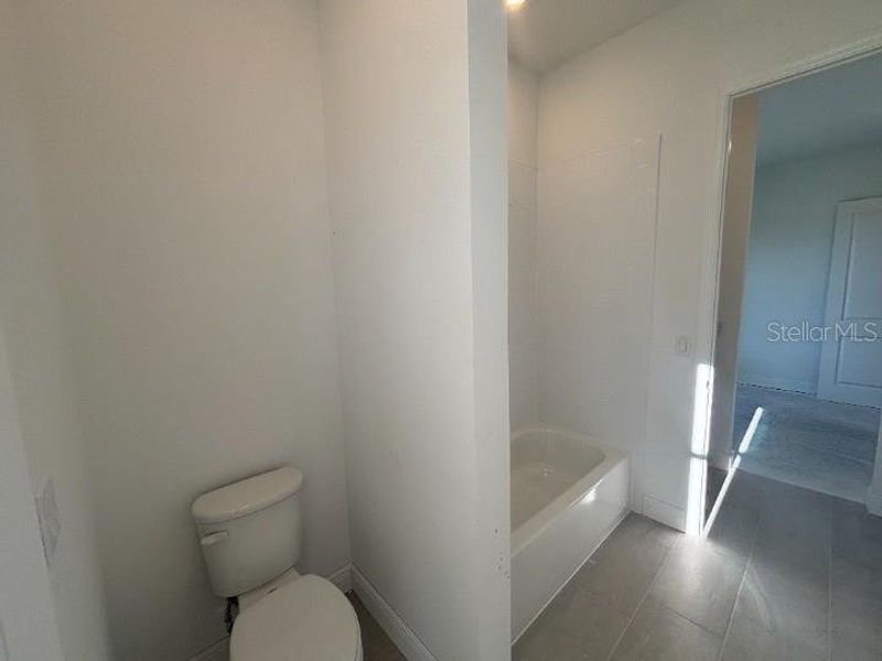 Furnished interior view inside a new home in Ardisia Park Estate, New Smyrna Beach (Image 14).