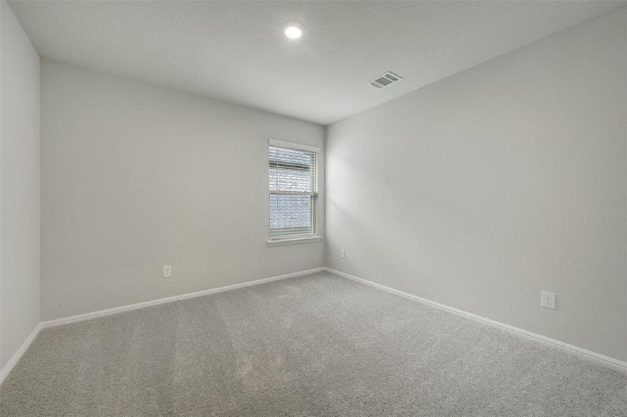 Spacious, unfurnished interior of a new home in Woodstone, Providence Village (Image 31).