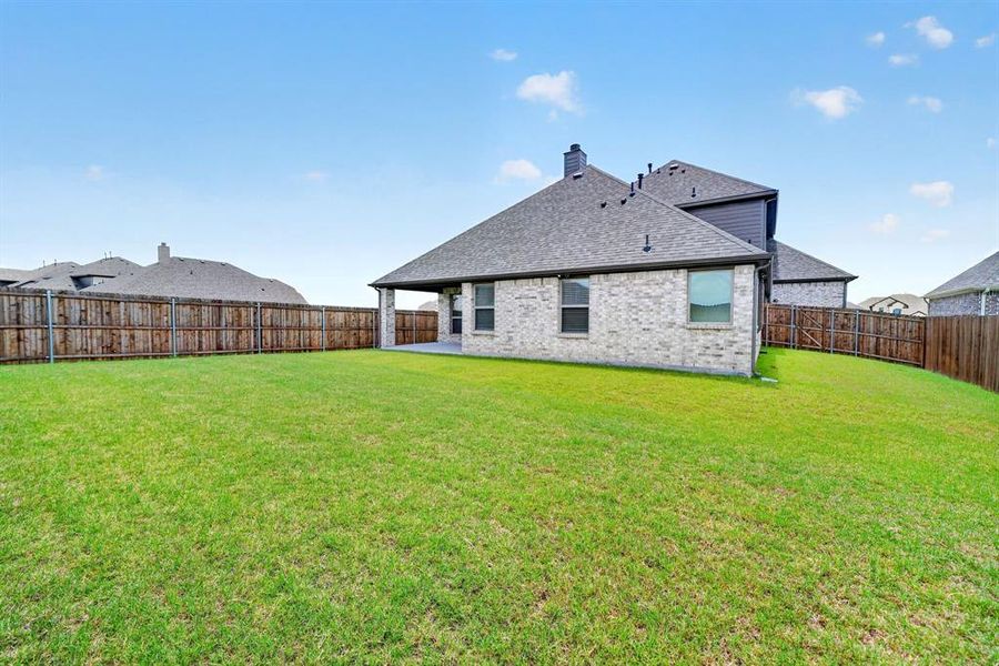 Exterior details and patio area of a home in Stone River Glen, Royse City (Image 21). Exterior details and patio area of a home in Stone River Glen, Royse City (Image 21).