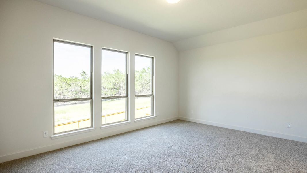 Unfurnished room featuring carpet flooring and baseboards Unfurnished room featuring carpet flooring and baseboards
