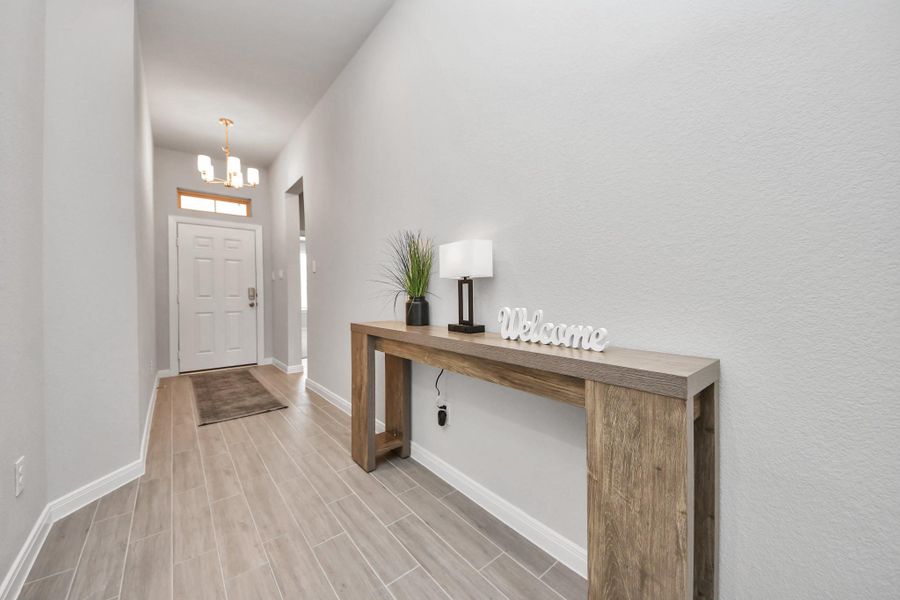 View facing front door from hallway entrance.