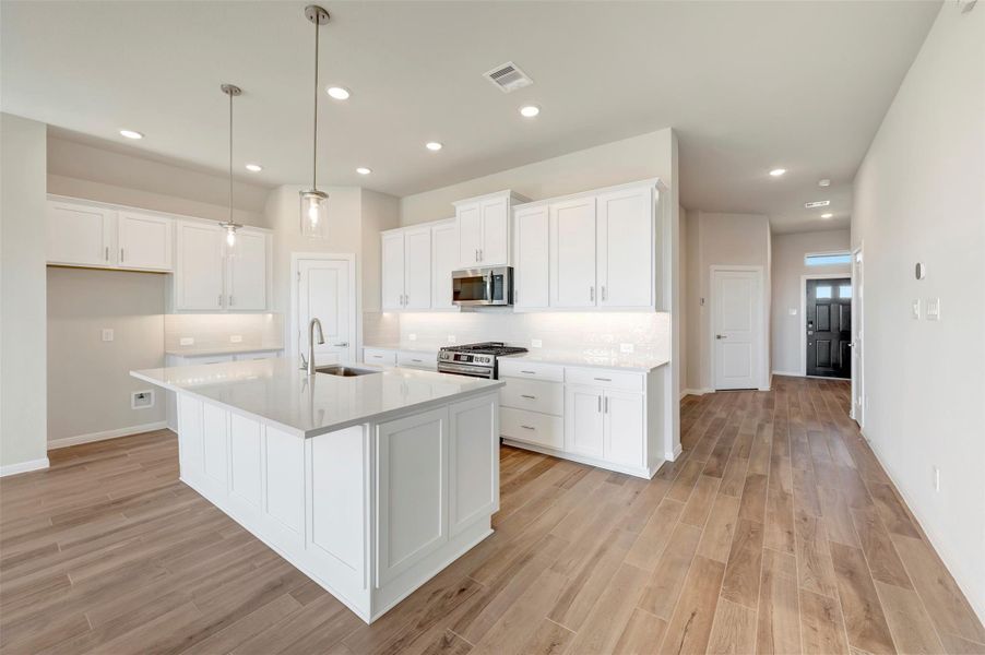 Furnished interior view inside a new home in The Grand Prairie 50’, Hockley (Image 10).
