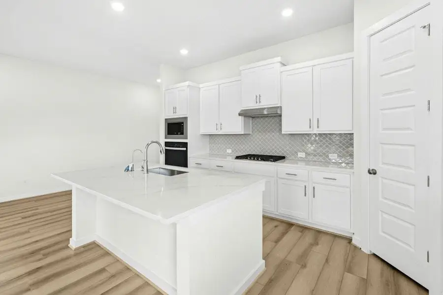 Furnished interior view inside a new home in The Colony, Bastrop (Image 6).