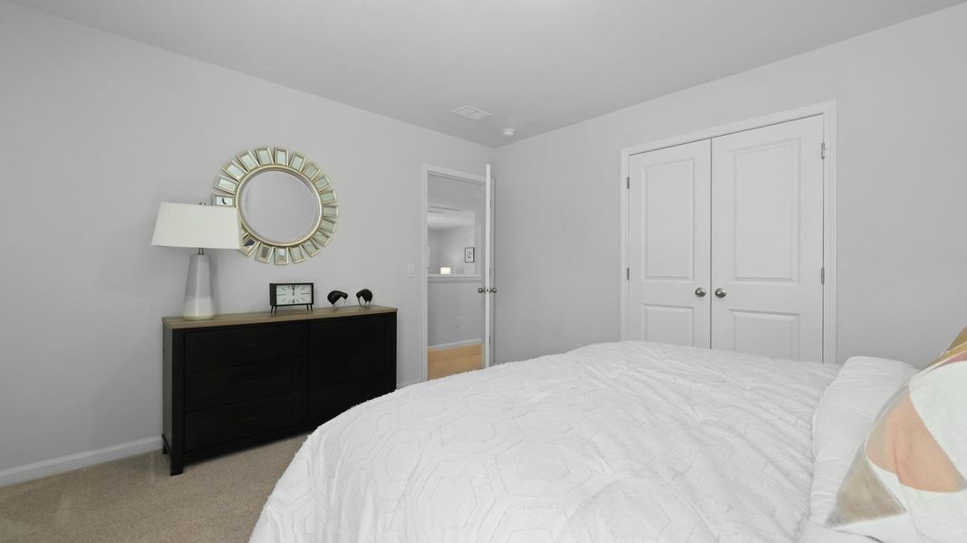 Furnished interior view inside a new home in Pine Hills at Cane Bay, Summerville (Image 30).