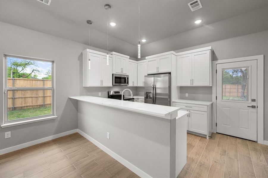 Furnished interior view inside a new home in , Kerens (Image 6).