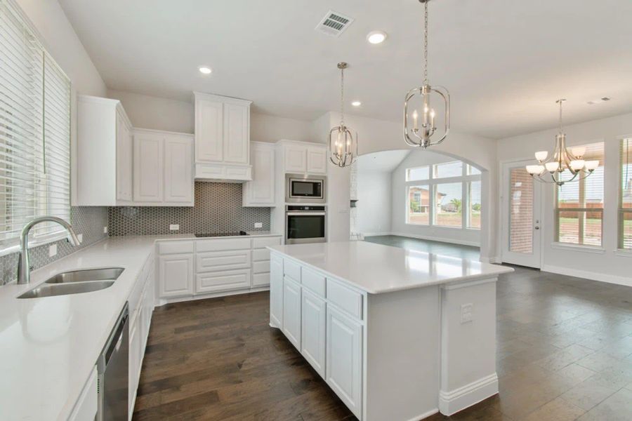 Kitchen | Concept 2797 at Hidden Creek Estates in Van Alstyne, TX by Landsea Homes