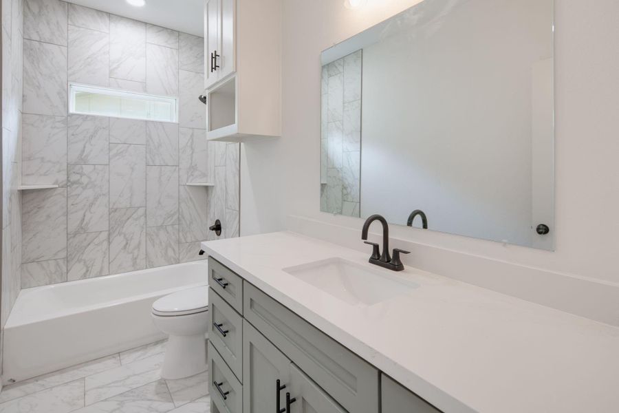 **Photos are of a previously built home with the same floorplan. Finishes are similar but not exact.