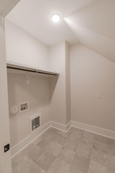 Representative unfurnished interior of a home built from the McKinley by Bill Clark Homes in The Sanctuary at Sunset Beach, Sunset Beach (Image 19). Representative unfurnished interior of a home built from the McKinley by Bill Clark Homes in The Sanctuary at Sunset Beach, Sunset Beach (Image 19).