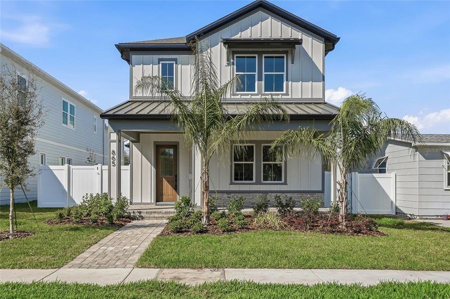 Front exterior of a new home in , St. Petersburg, FL, highlighting curb appeal (Image 26).