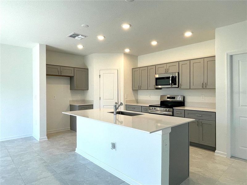 Furnished interior view inside a new home in Ranches at Lake Mcleod, Eagle Lake (Image 9).