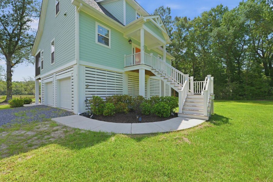 Exterior details and patio area of a home in , Johns Island (Image 35). Exterior details and patio area of a home in , Johns Island (Image 35).