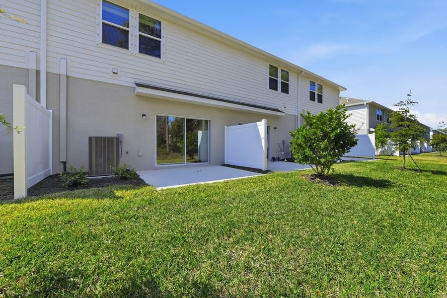 Exterior details and patio area of a home in Vinterra Townhomes, Nokomis (Image 2). Exterior details and patio area of a home in Vinterra Townhomes, Nokomis (Image 2).