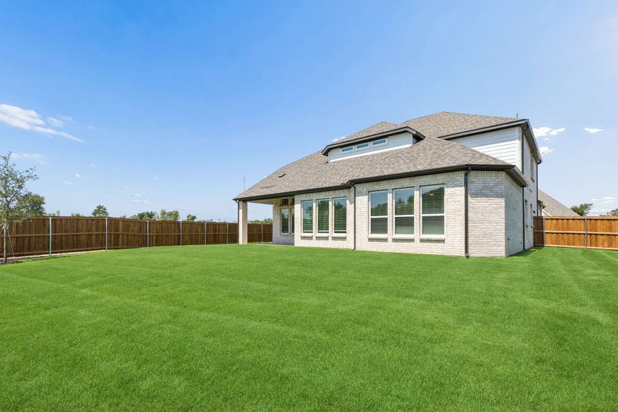 Exterior details and patio area of a home in Rainwater Crossing, Celina (Image 21).