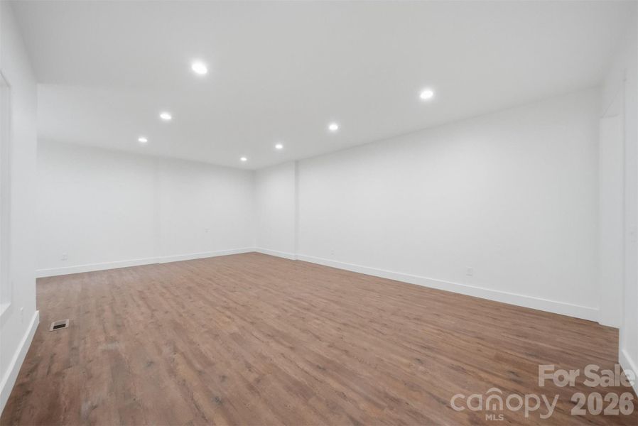 Spacious, unfurnished interior of a new home in , Lenoir (Image 32).