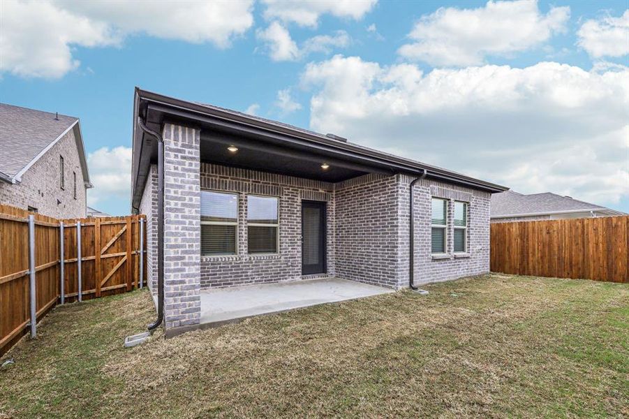 Exterior details and patio area of a home in Parks at Foster Crossing - Spring Series, Anna (Image 24).