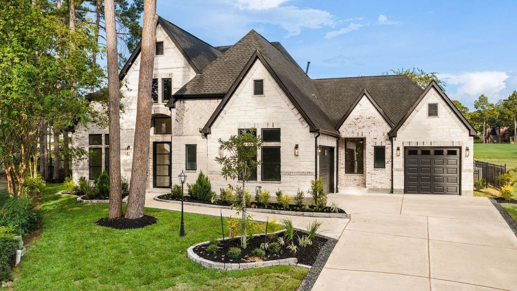 Front exterior of a new home in , Montgomery, TX, highlighting curb appeal (Image 23).