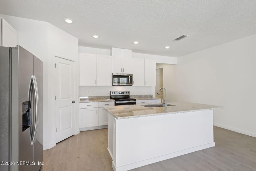 Furnished interior view inside a new home in Flagler Village - Signature Series, Palm Coast (Image 8).