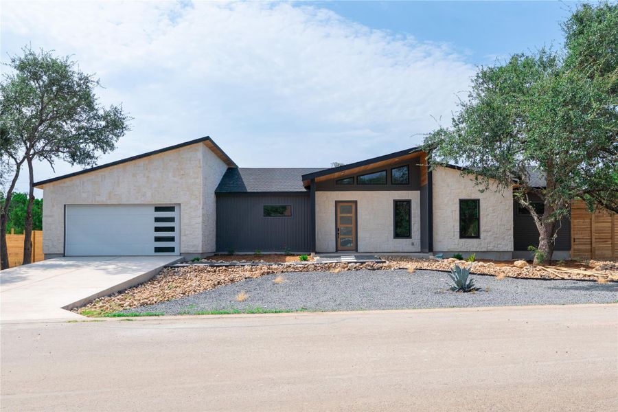 Front exterior of a new home in , Wimberley, TX, highlighting curb appeal (Image 2). Front exterior of a new home in , Wimberley, TX, highlighting curb appeal (Image 2).