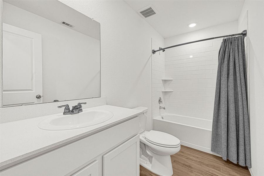 Furnished interior view inside a new home in Townsend Reserve: Cottage Collection, Splendora (Image 13). Furnished interior view inside a new home in Townsend Reserve: Cottage Collection, Splendora (Image 13).