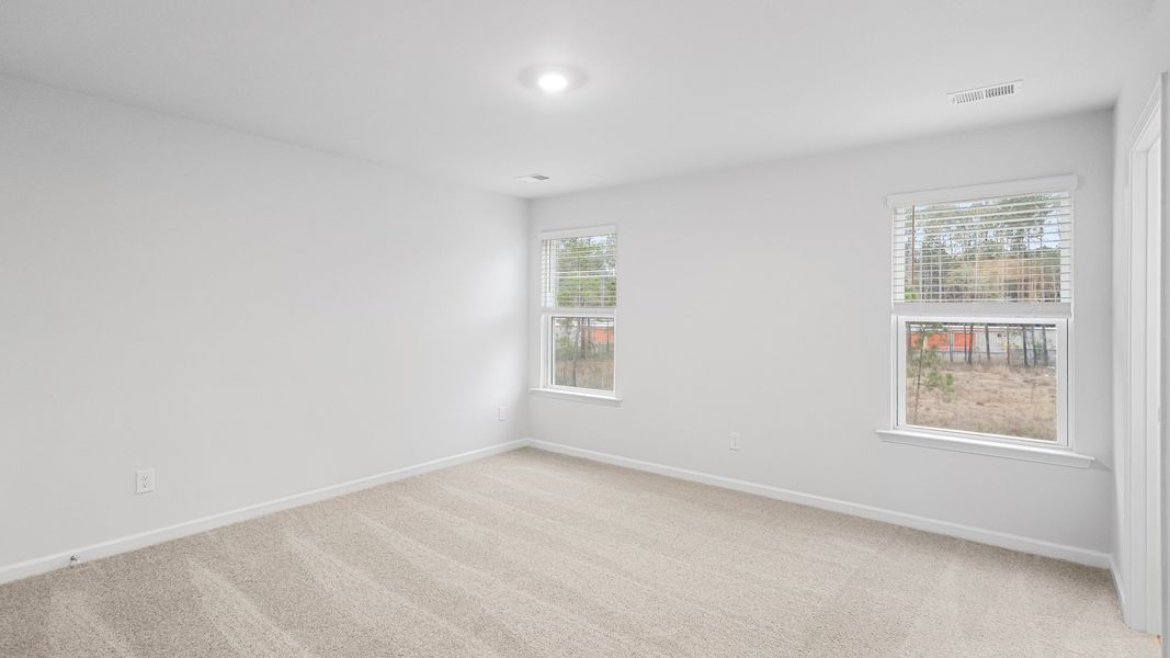 Spacious, unfurnished interior of a new home in Pine Hills at Cane Bay, Summerville (Image 17).
