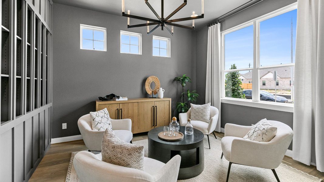 Representative furnished interior of a home built from the Magnolia by Brightland Homes in Sunterra, Katy (Image 10).