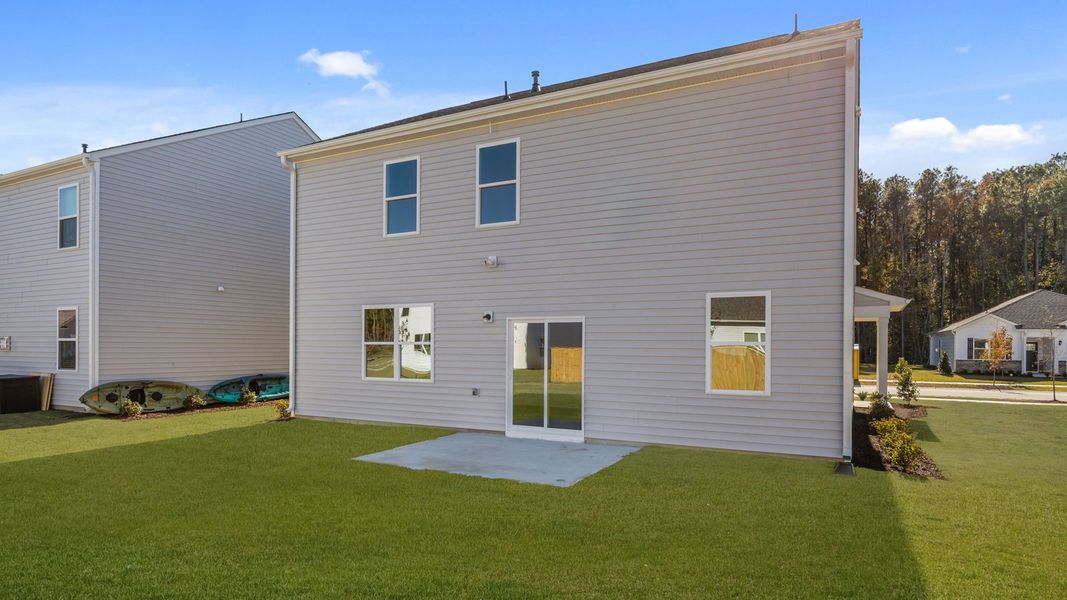 Exterior details and patio area of a home in West New Bern, New Bern (Image 23).