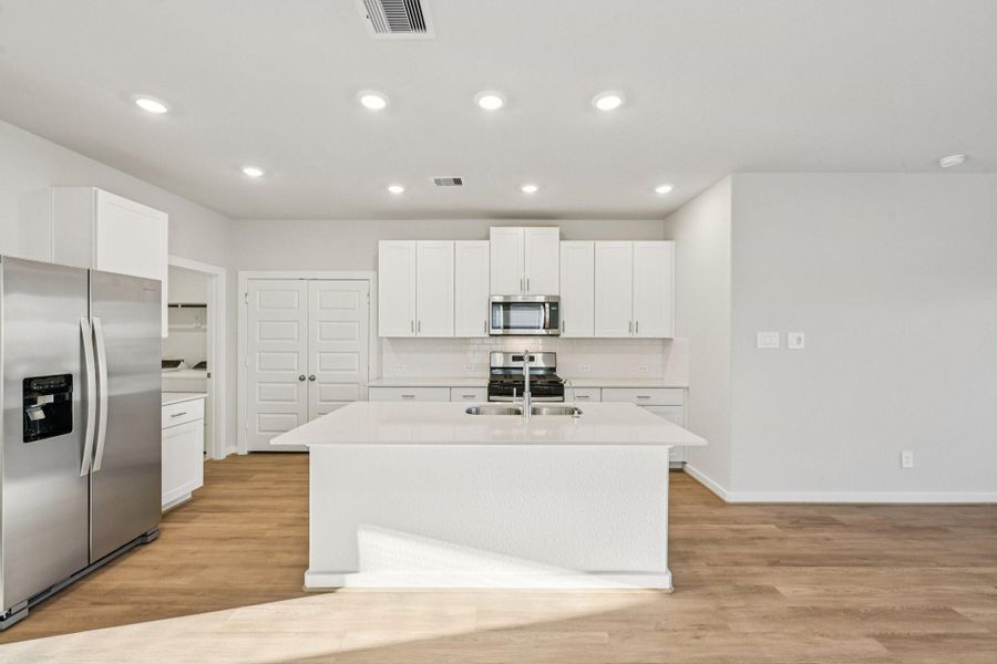 Furnished interior view inside a new home in Landing Meadows - Traditional Series, New Caney (Image 12). Furnished interior view inside a new home in Landing Meadows - Traditional Series, New Caney (Image 12).