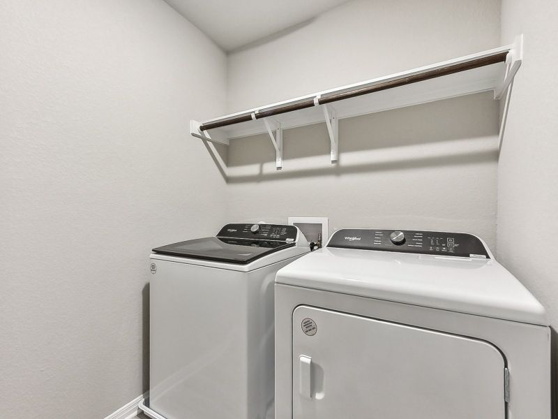 The spacious laundry room helps make laundry day a breeze.