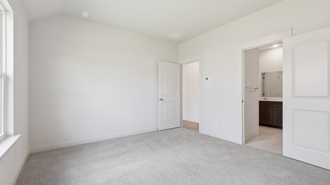 Furnished interior view inside a new home in Patriot Estates, Venus (Image 41).