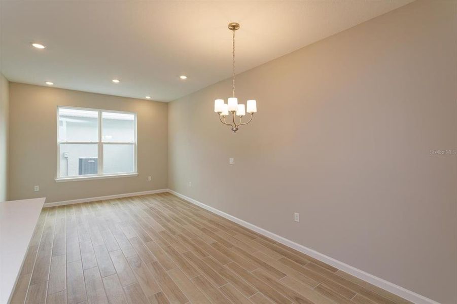 Spacious, unfurnished interior of a new home in Serenade at Ovation, Winter Garden (Image 23).