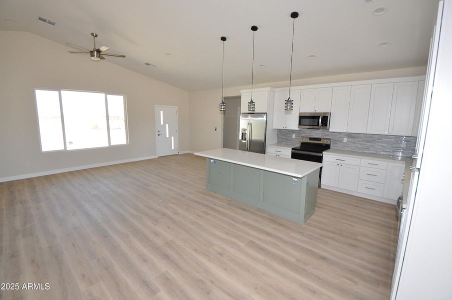 Kitchen & Great room from back door Kitchen & Great room from back door