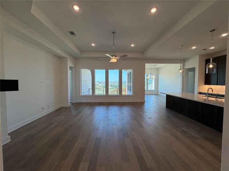 Family Room with tray ceiling & fireplace Family Room with tray ceiling & fireplace