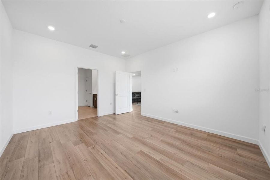Spacious, unfurnished interior of a new home in The Timbers at Everlands, Palm Bay (Image 21).
