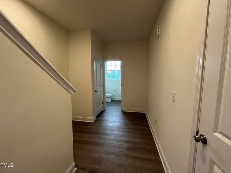 Back Hallway leading to half bath/Garage