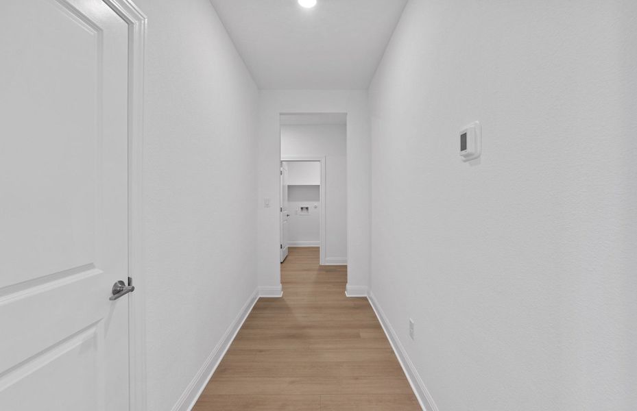 Spacious, unfurnished interior of a new home in Bluffview Reserve, Leander (Image 57).