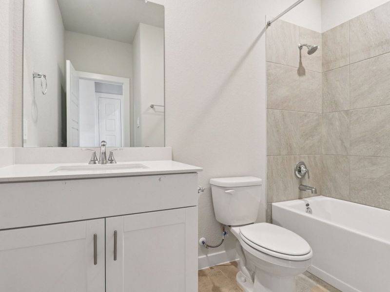 Furnished interior view inside a new home in Sanford Farms - Traditional Series, Waller (Image 9).