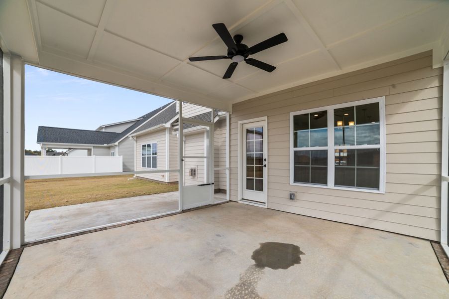 Exterior details and patio area of a home in Eli's Ridge, Winterville (Image 31).