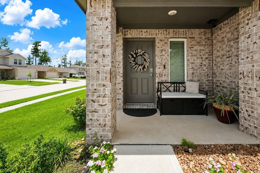 Exterior details and patio area of a home in , Spring (Image 2). Exterior details and patio area of a home in , Spring (Image 2).