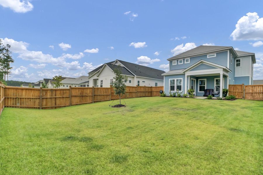 Exterior details and patio area of a home in Midtown at Nexton, Summerville (Image 31).