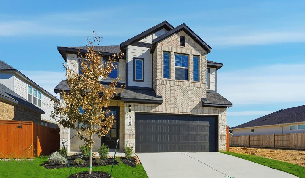 Front exterior of a new home in Stillwater Ranch, San Antonio, TX, highlighting curb appeal (Image 21).