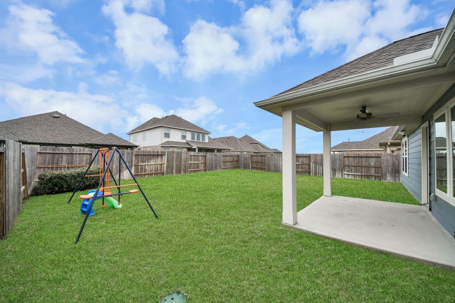 Exterior details and patio area of a home in Marvida, Cypress (Image 3).