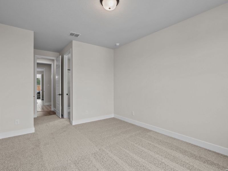 Spacious, unfurnished interior of a new home in The Reserve at Potranco Oaks, Castroville (Image 27).