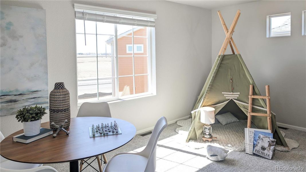 Furnished interior view inside a new home in Thompson River Ranch, Johnstown (Image 25).