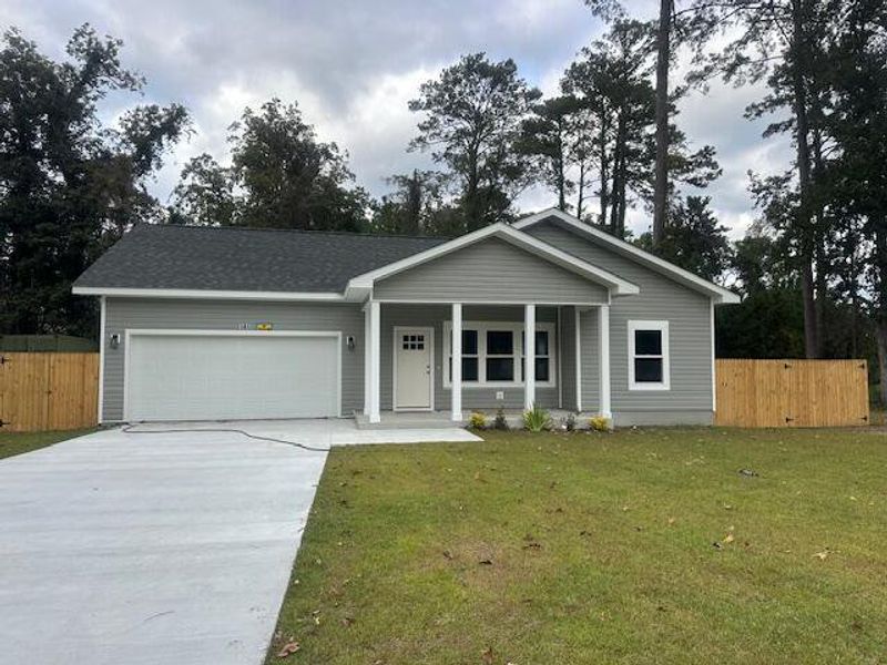 Front exterior of a new home in , Beaufort, SC, highlighting curb appeal (Image 17).