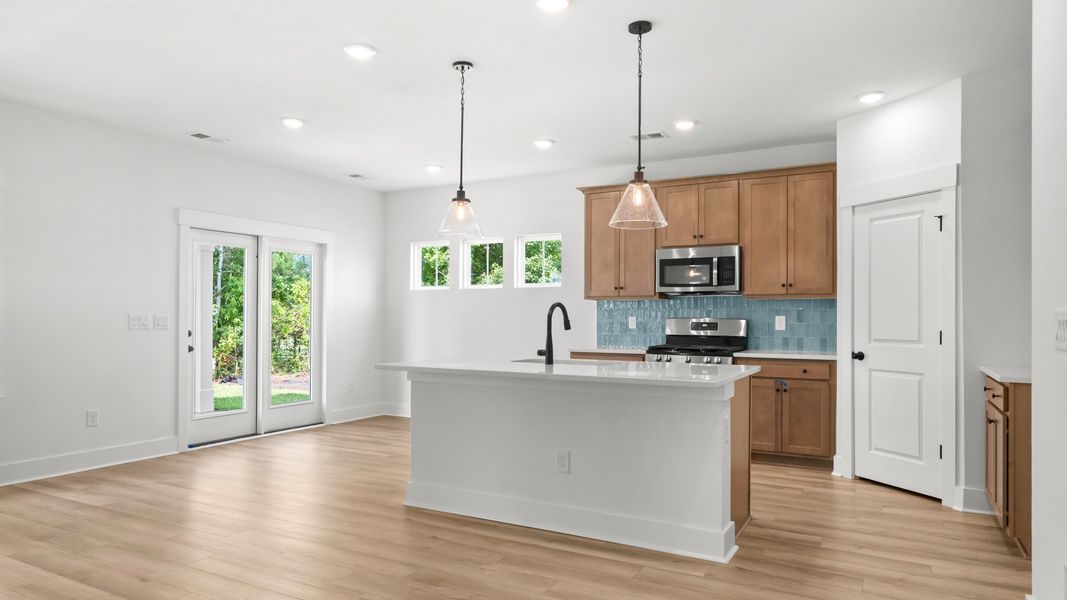 Furnished interior view inside a new home in Bluffs at Sun Colony, Longs (Image 5).
