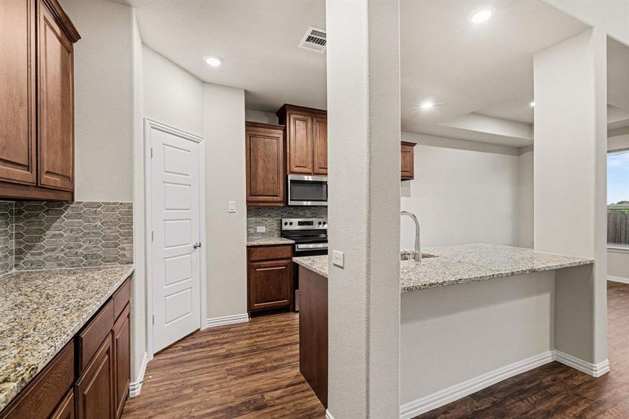 Furnished interior view inside a new home in Courts Of Bonnie Brae, Denton (Image 7).